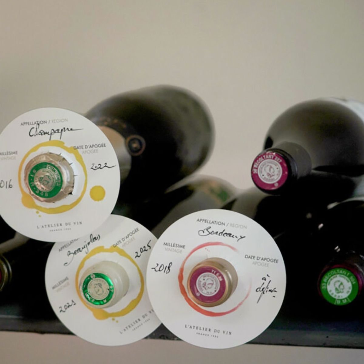 wine cellar tags on bottle necks