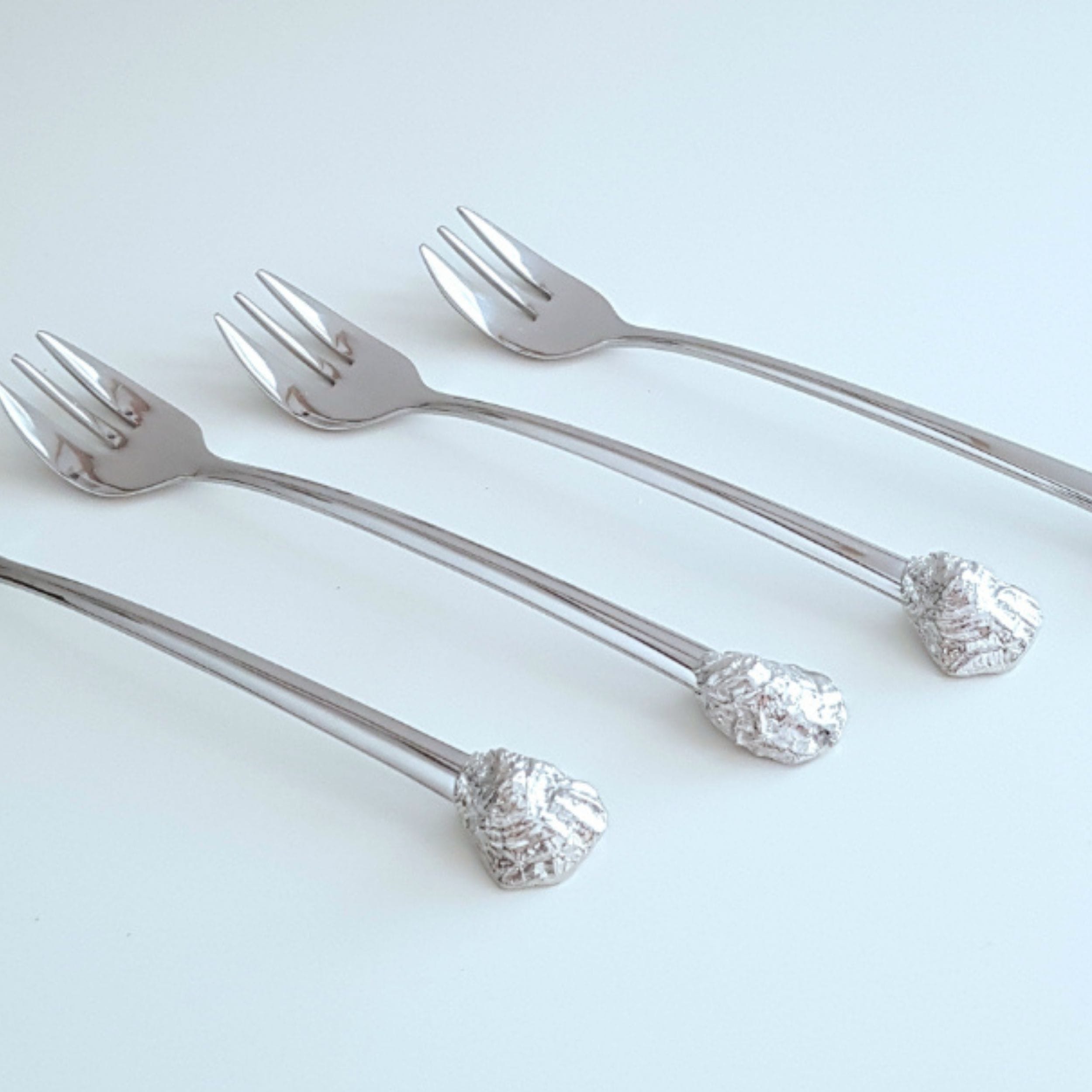 4 tin oysterforks from Anovi