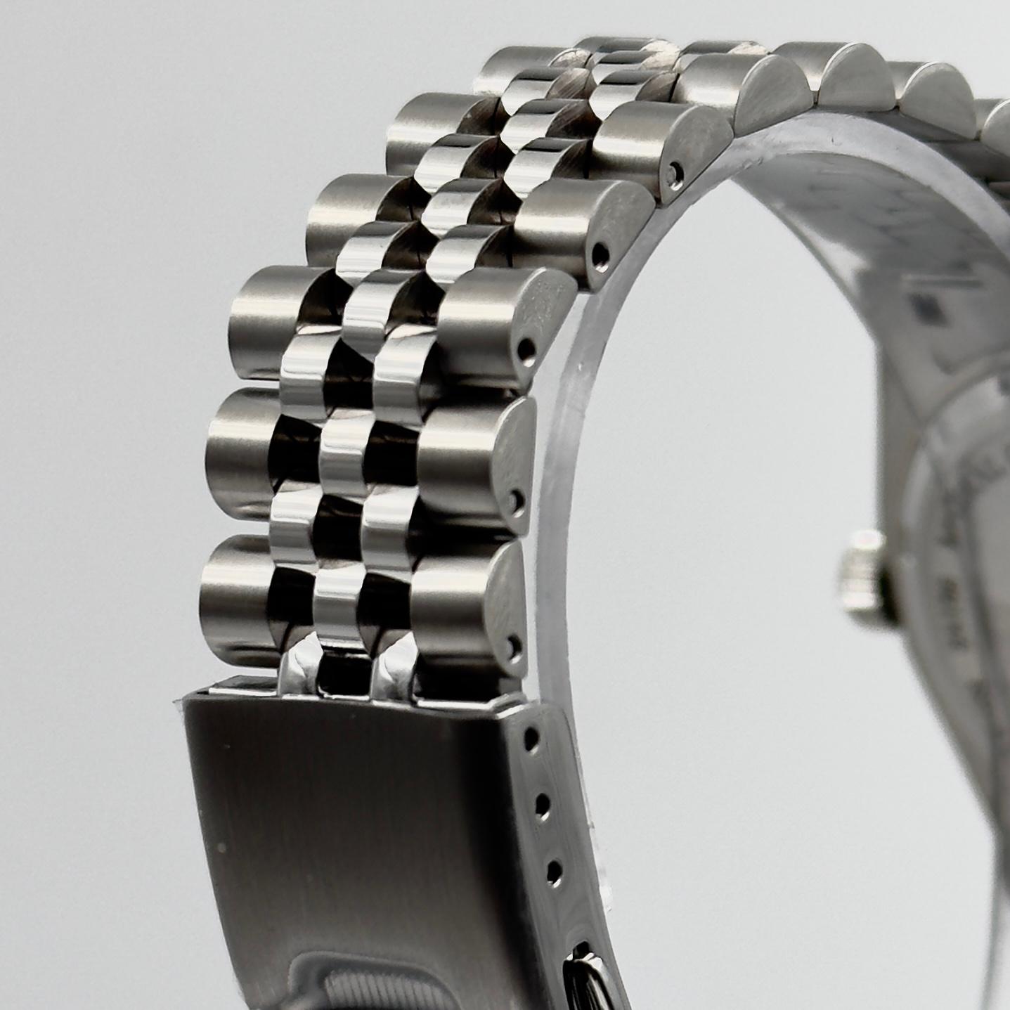 Side view of the stainless steel case of the Bierkensteyn Date 38 Blue, showcasing the fluted bezel and domed crystal