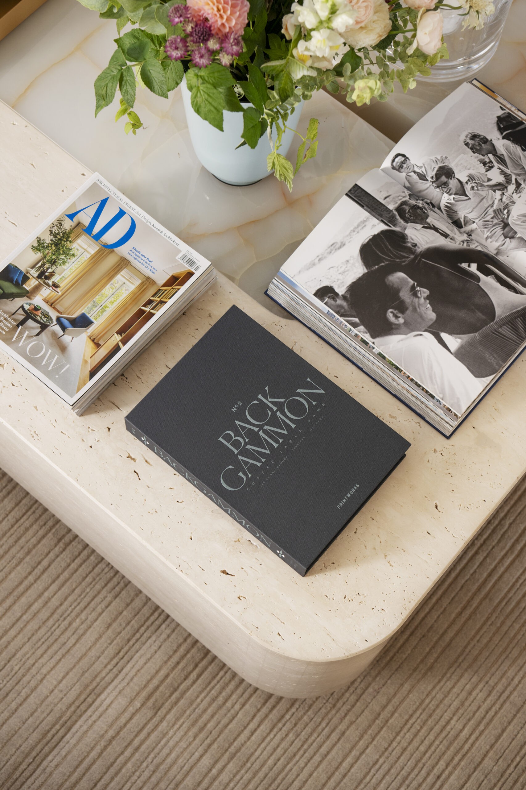 Beautiful backgammon game in coffee table edition of Printworks on a table