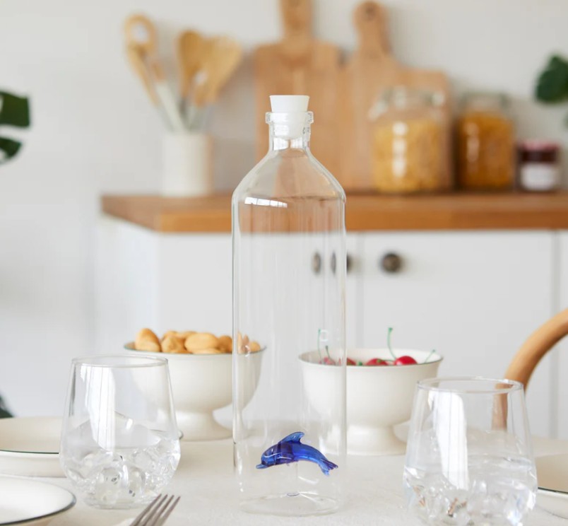 Dolphin bottle Balvi on the table