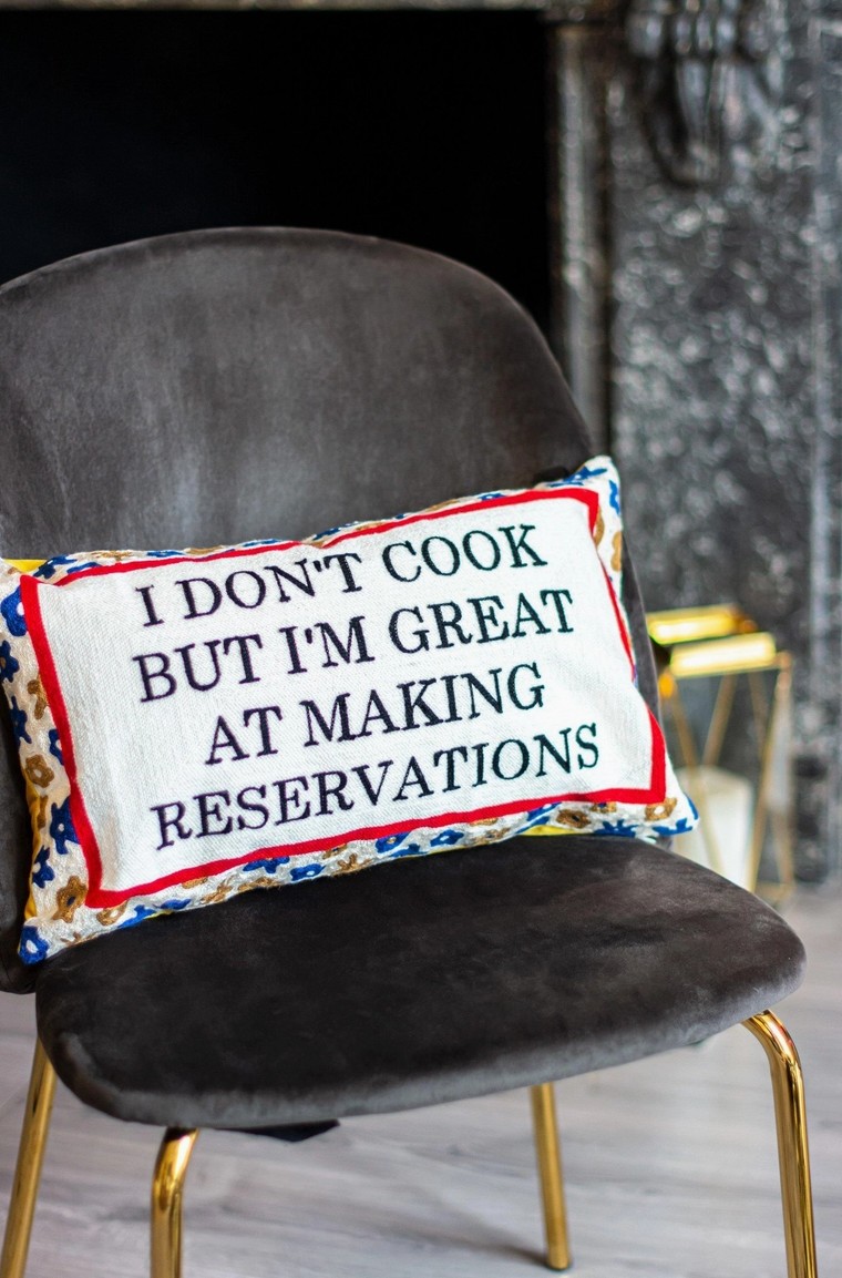 “I Don’t Cook” funny kitchen cushion with floral border and navy velvet back. detail close up