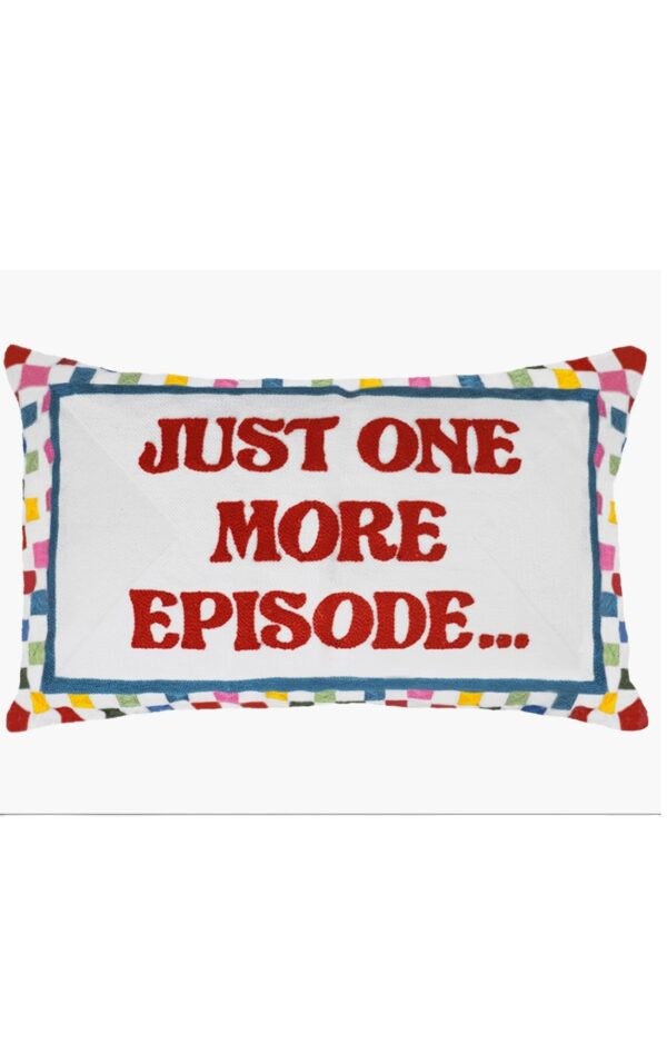 “Just One More Episode” handmade needlepoint cushion with checkerboard pattern.