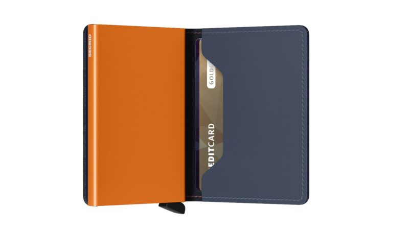 Secrid Slimwallet with nightblue leather and orange Cardprotector.