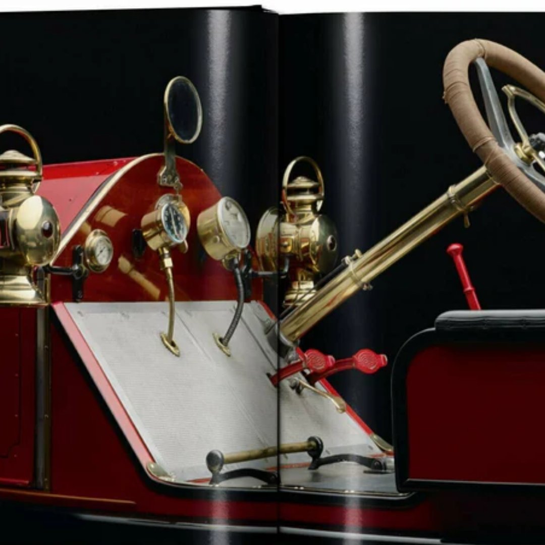 Luxury coffee table book showcasing iconic sports cars including Ferrari 250 GTO and Mercedes-Benz 300 SLR