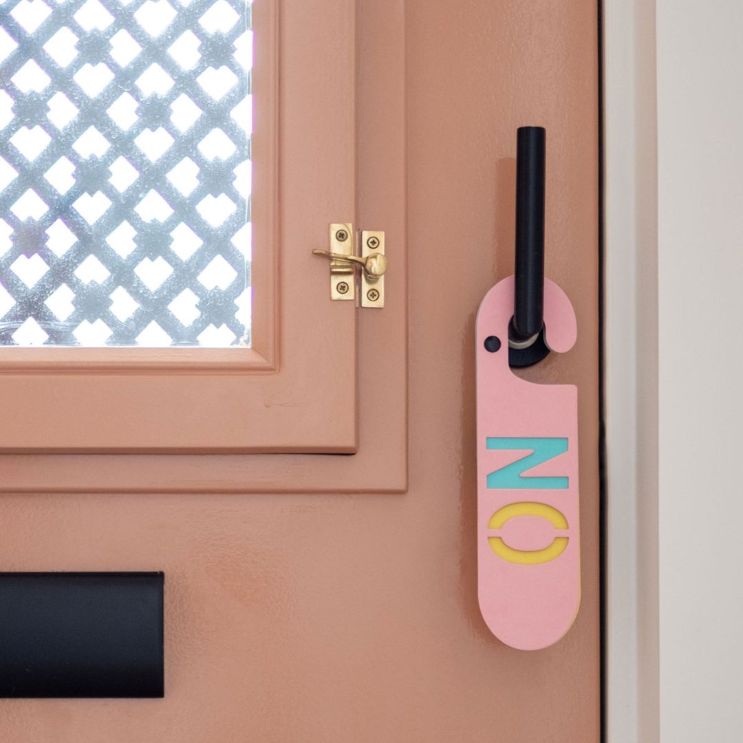 Pink and green YES NO colorful door hanger made of sustainable cardboard