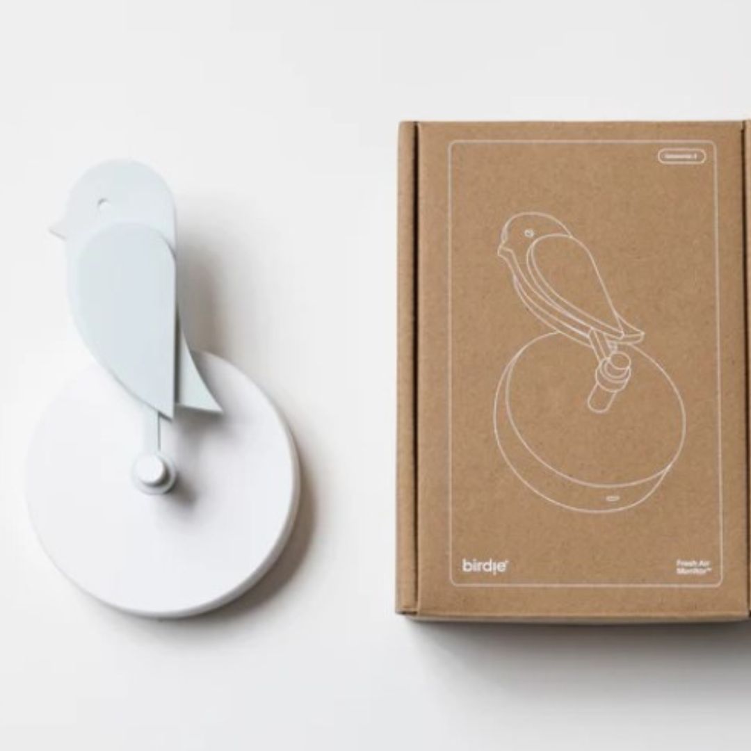 Birdie 2.0 air quality monitor for home in Glacier light blue mounted on wall