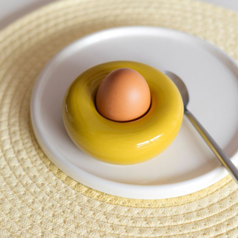 Mustard yellow stoneware egg cups from the Billie collection, set of two with glossy finish