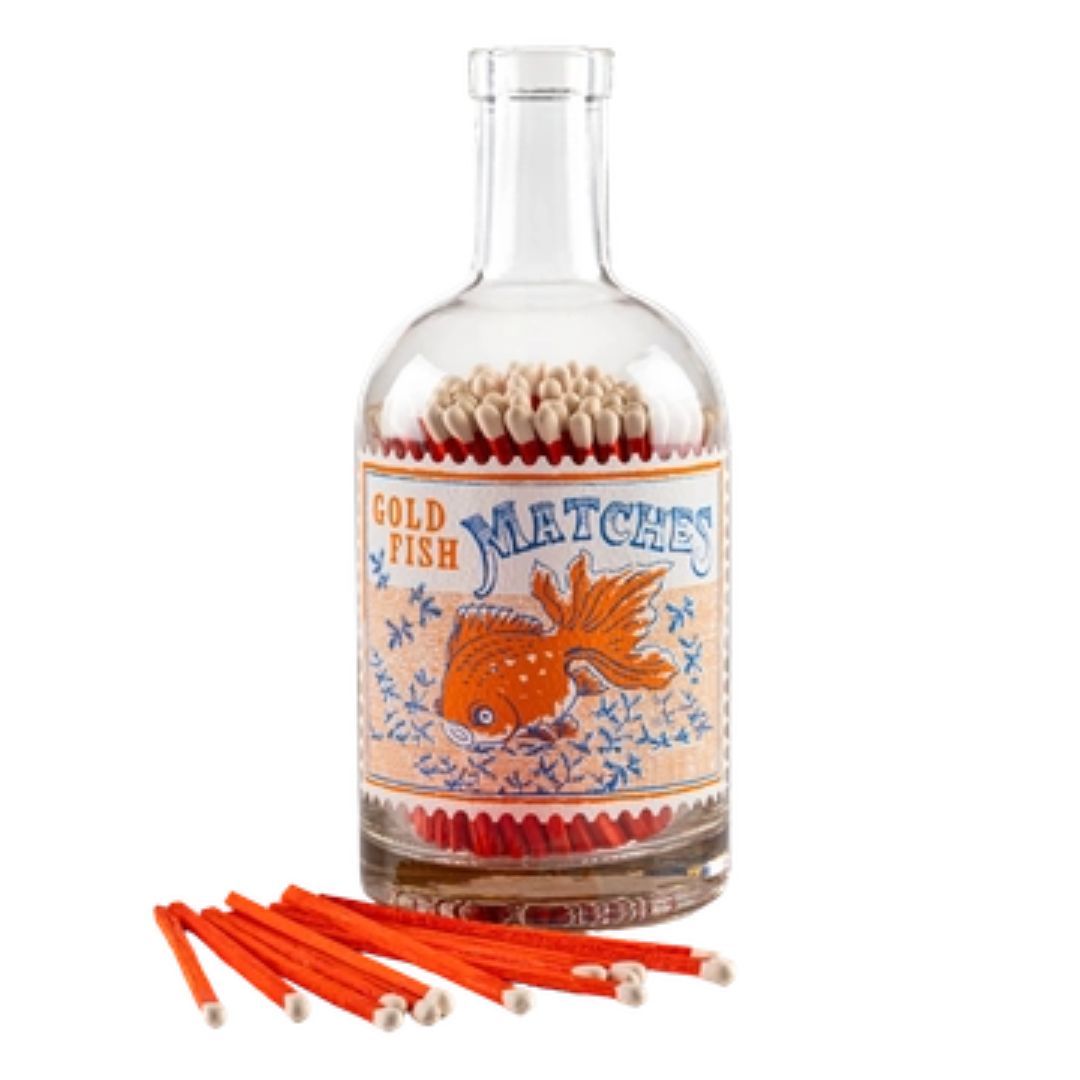 Goldfish matches in a bottle glass match bottle with vintage label and red matches