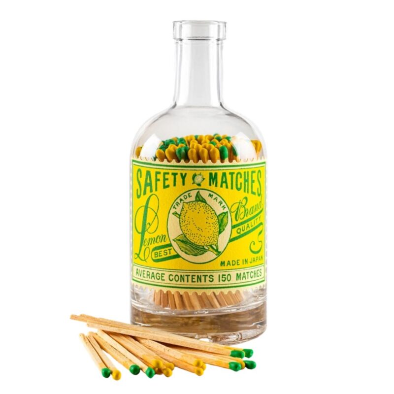Bottle filled with colourful candle matches and finished with a bright lemon label. A stylish and practical accessory for lighting candles.