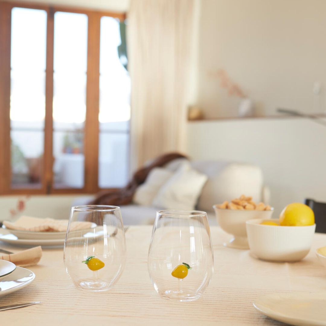 Lemon glass set of 2 handcrafted borosilicate glasses by Balvi. A playful citrus design that pairs perfectly with the matching lemon bottle.