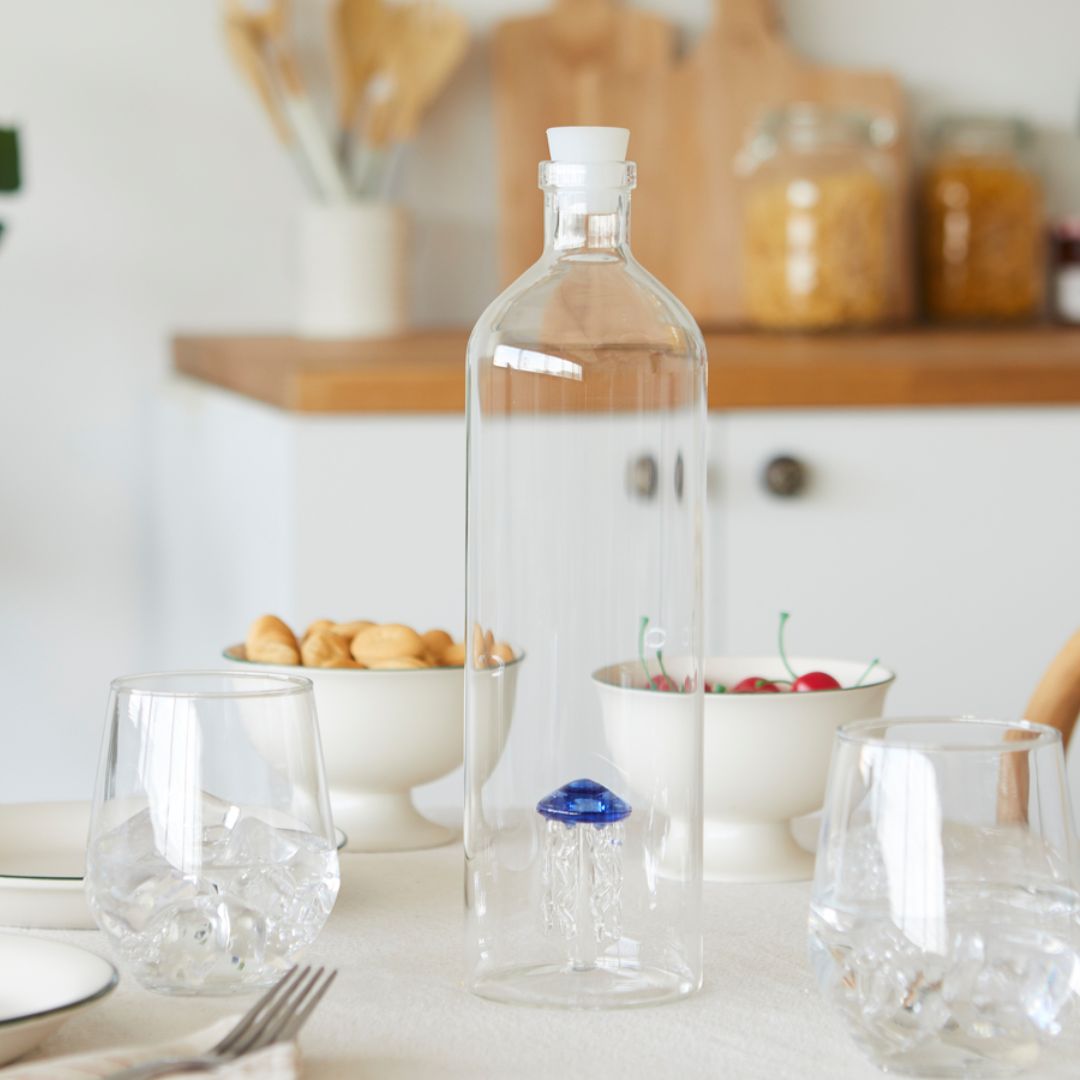 Balvi medusa glass water bottle with blue jellyfish design inside made of borosilicate glass