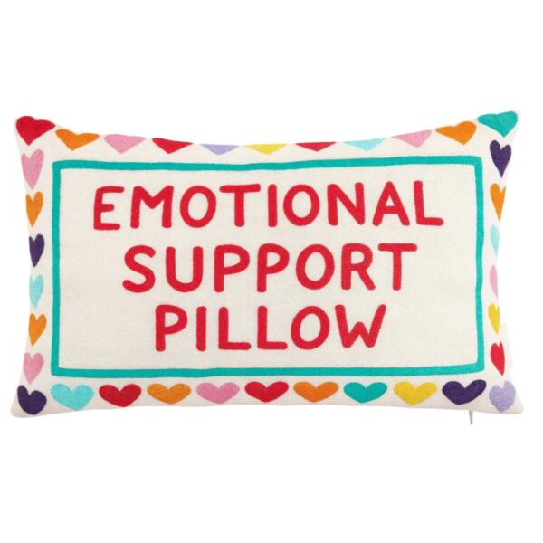 Emotional Support Pillow with embroidered hearts by The Pillow Drop on a sofa in a cosy living room