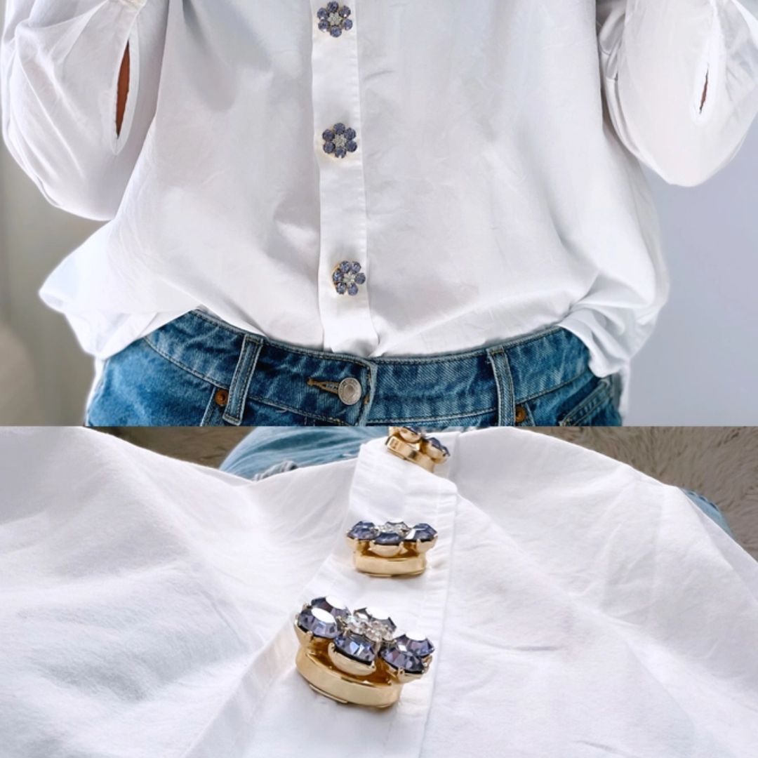 Named after the founder’s oma Hildegard, Hilde combines softness, elegance and personality in one refined accessory.Unlike traditional brooches or pins, these button charms simply click onto existing buttons up to 13 mm wide. No sewing and no permanent changes — just an effortless way to elevate shirts, blazers, cardigans or jackets within seconds.And honestly? They feel less like accessories and more like jewellery for your clothes.