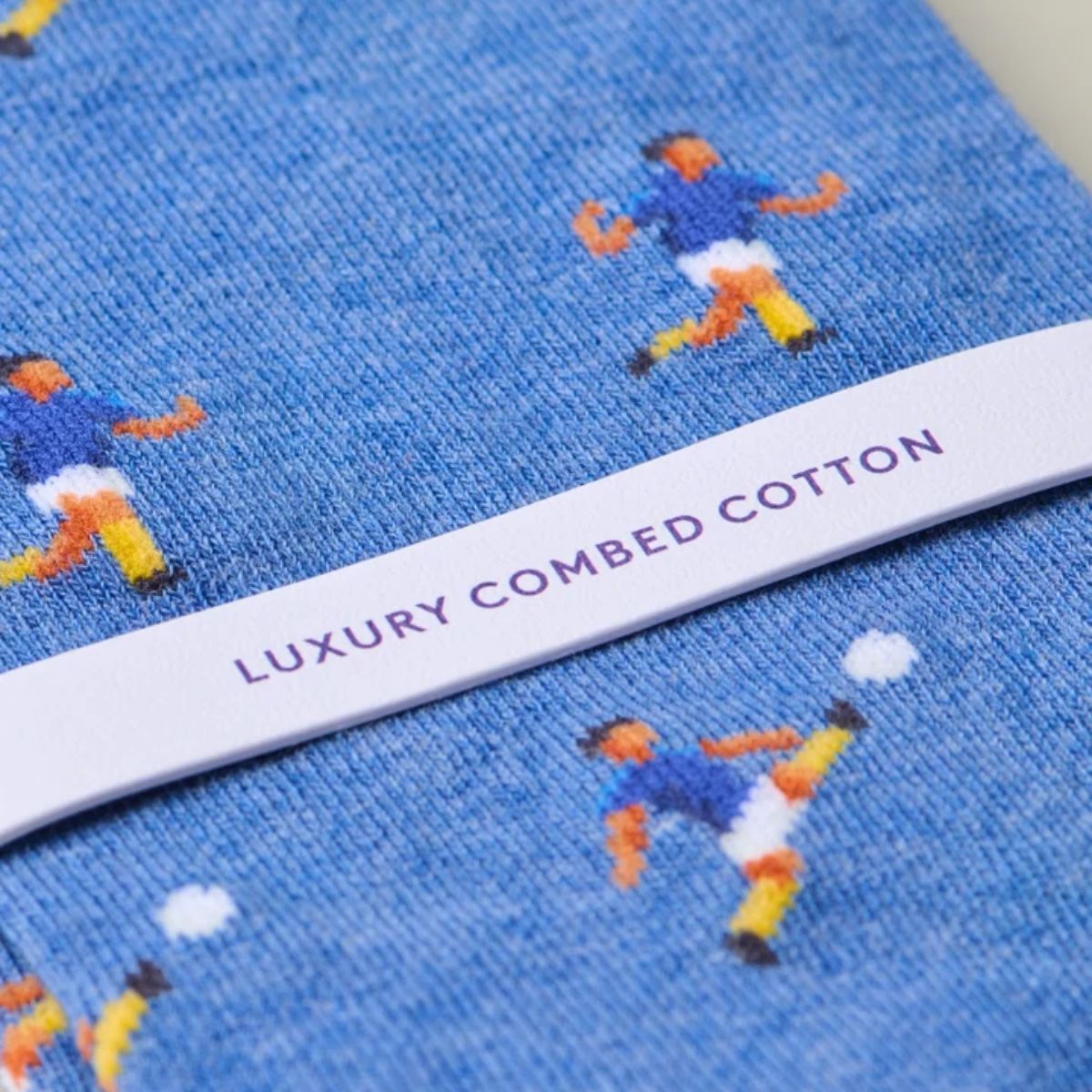 Premium organic cotton football socks with knitted designs